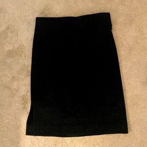 Black, below the knee slim skirt.